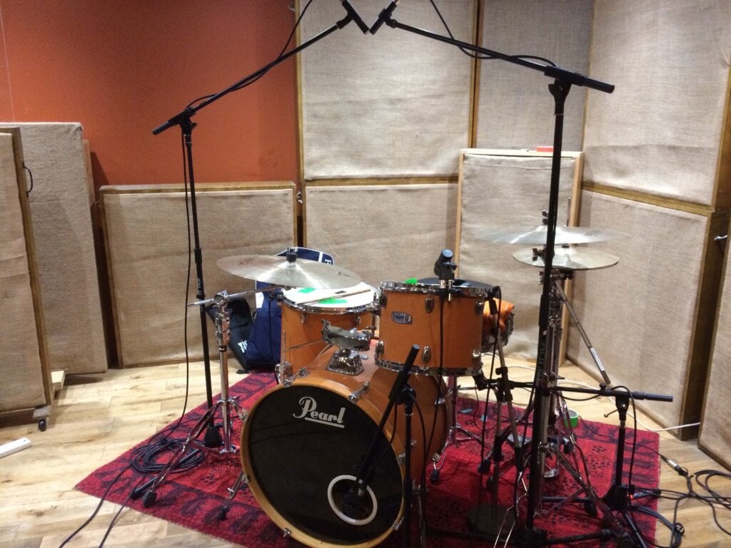 Drum kit miked in studio
